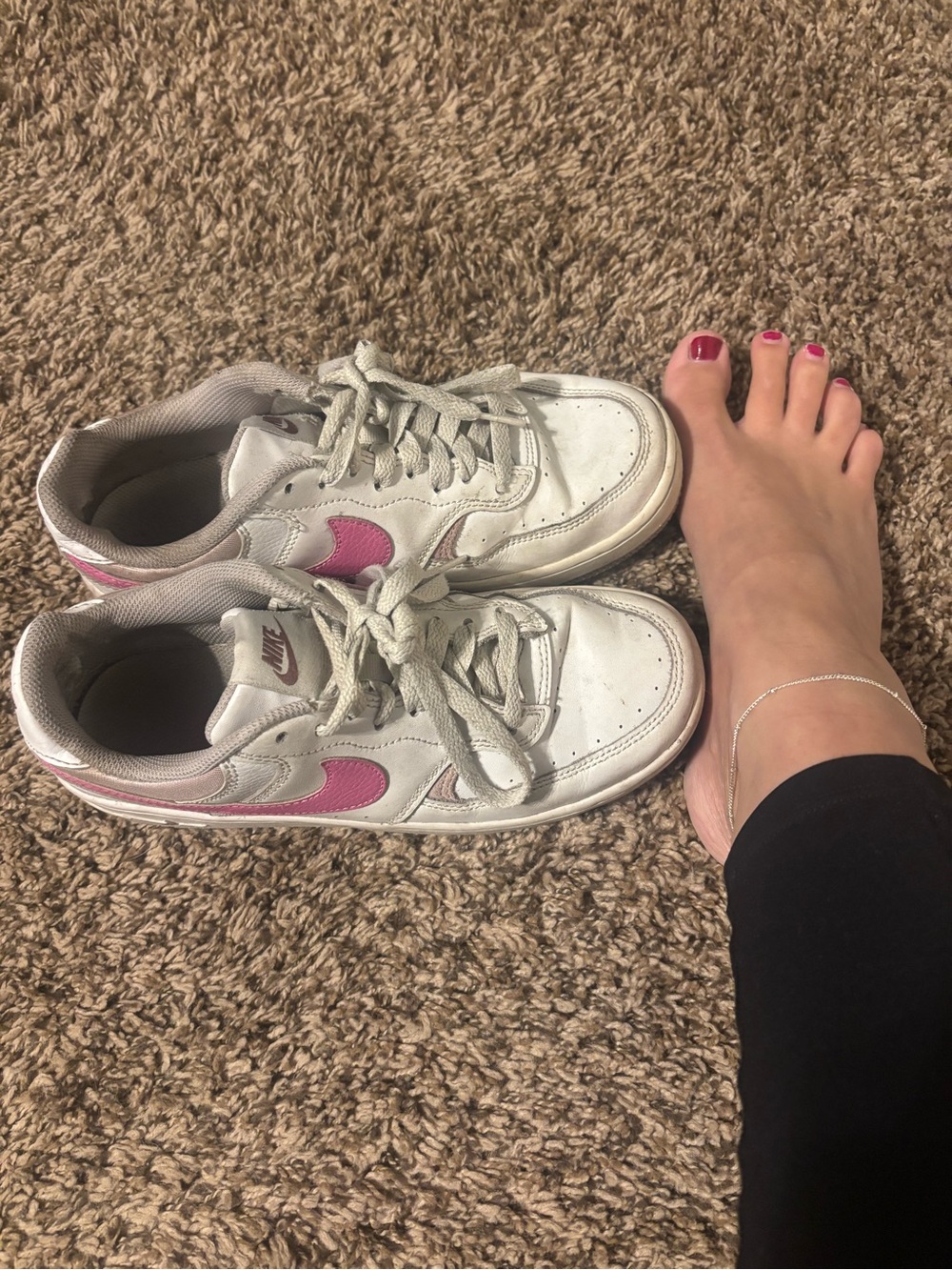 Nike Women's White Sneakers with Pink Swoosh
